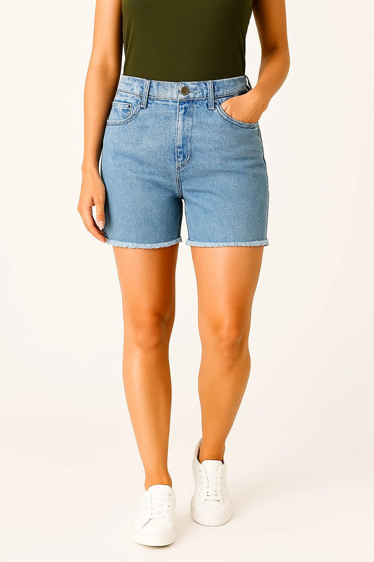 Person wearing light blue denim shorts on a white background