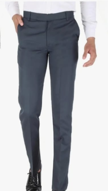 Gray pants worn by a person on a white background