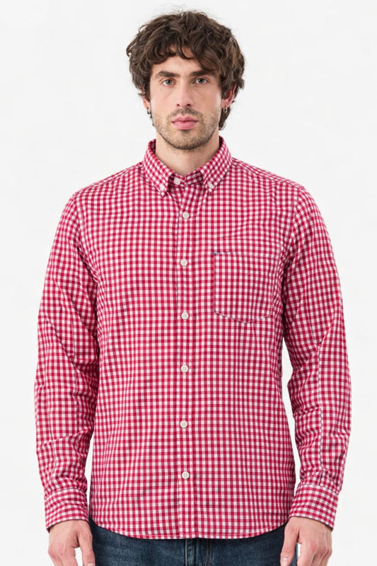Man wearing a red and white checkered shirt on a white background