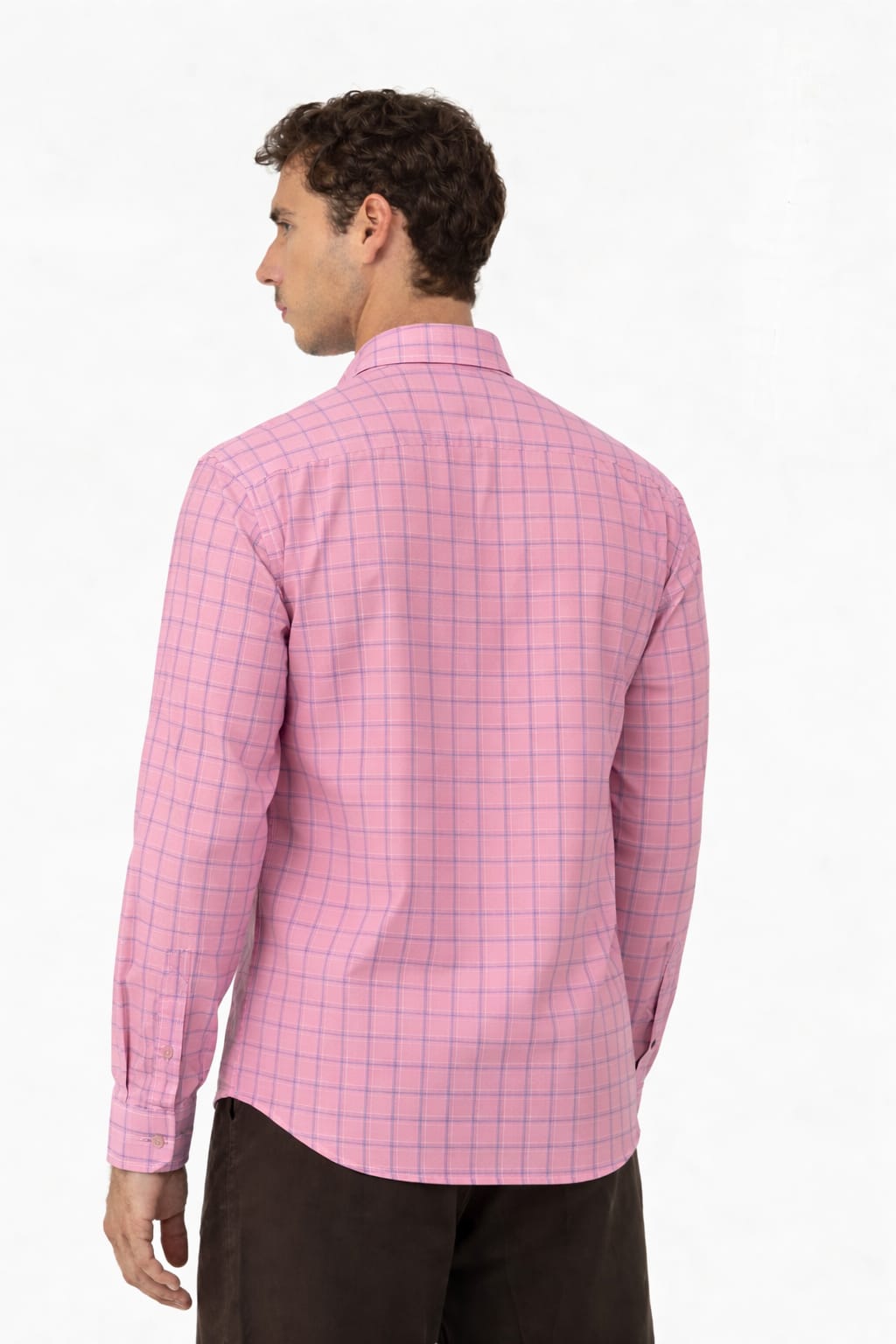 Man wearing a pink checkered shirt on a white background