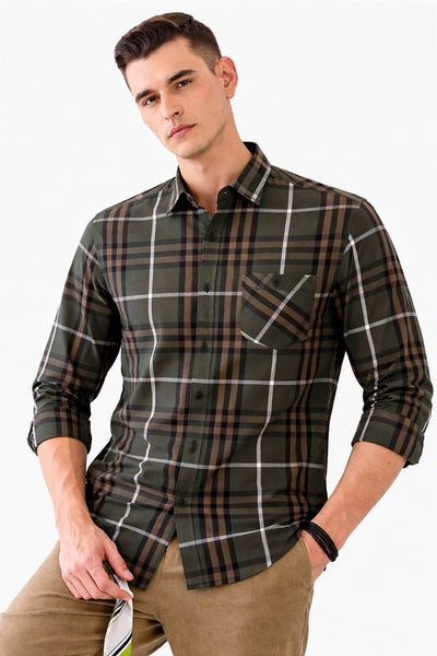 Man wearing a plaid shirt on a white background