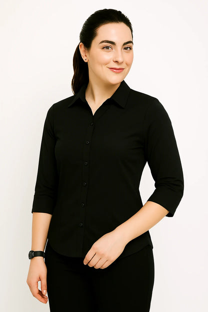 Woman wearing a black shirt against a white background