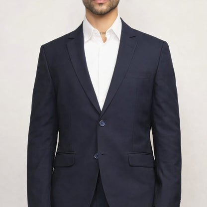 Navy blue suit jacket worn by a person on a light gray background