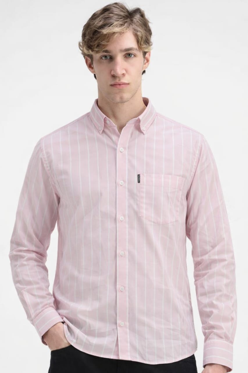 Person wearing a pink checkered shirt on a white background