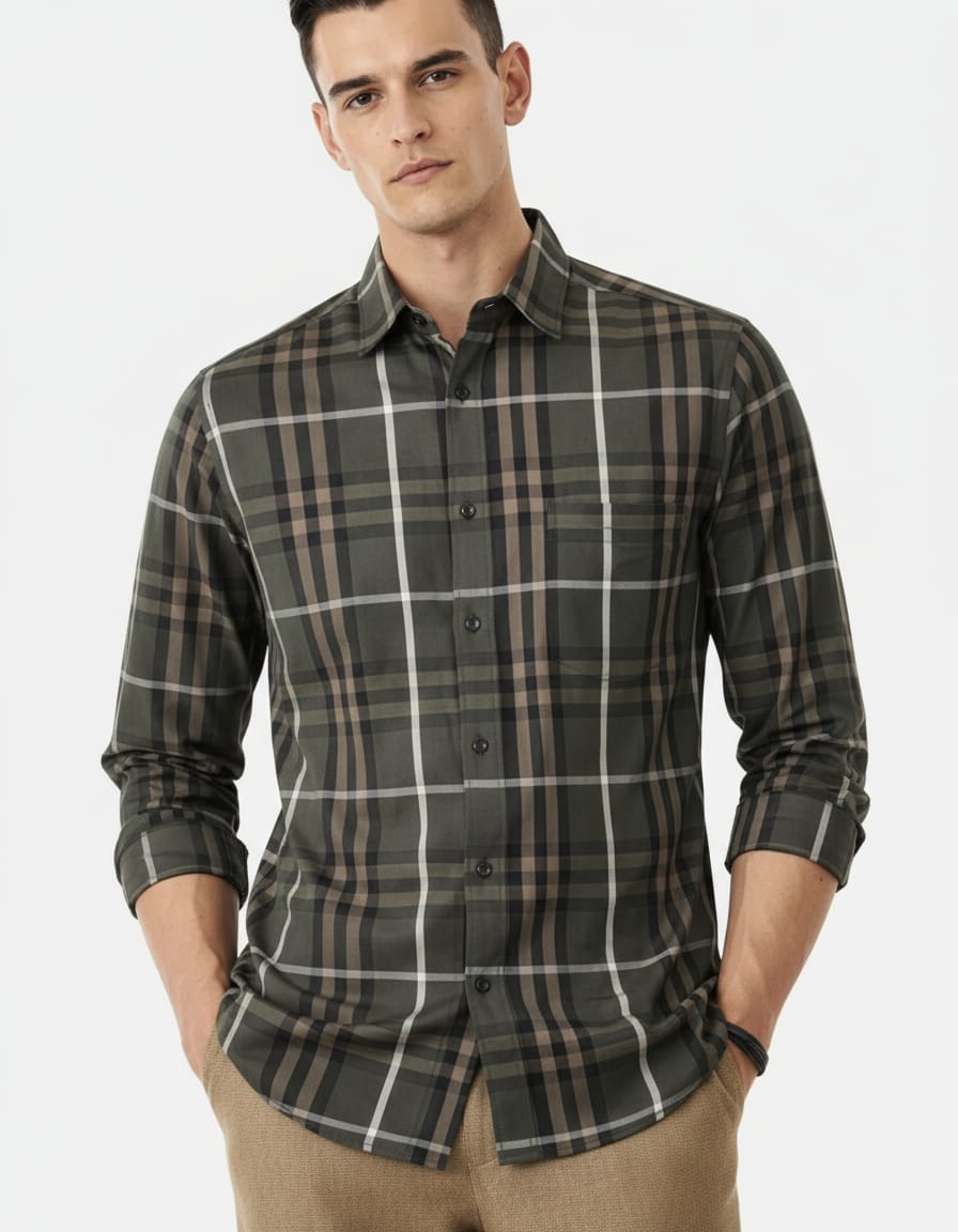 Man wearing a plaid shirt on a white background