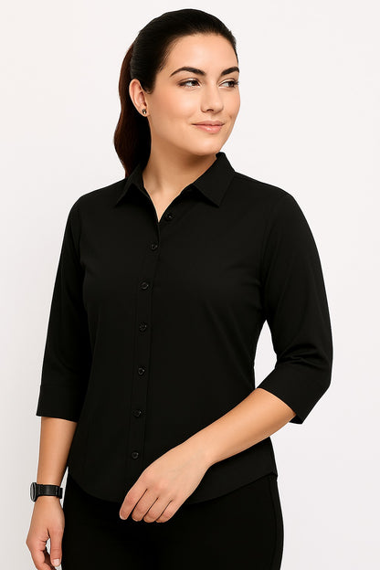 Woman wearing a black shirt against a white background
