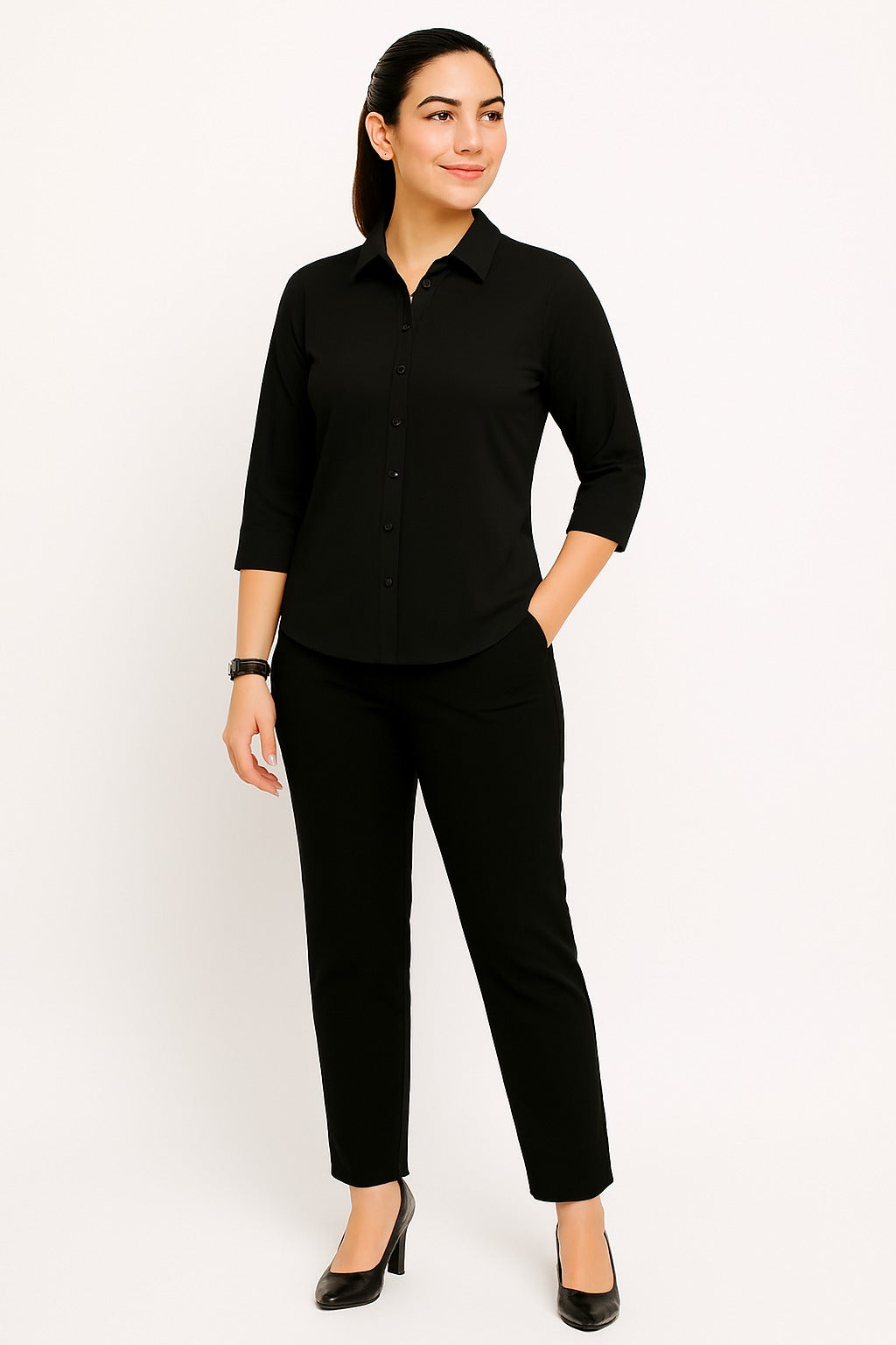 Woman wearing a black shirt and black pants on a white background