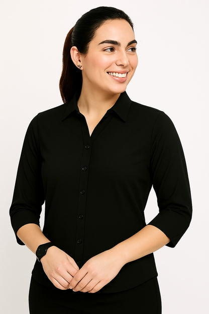 Woman wearing a black shirt against a white background
