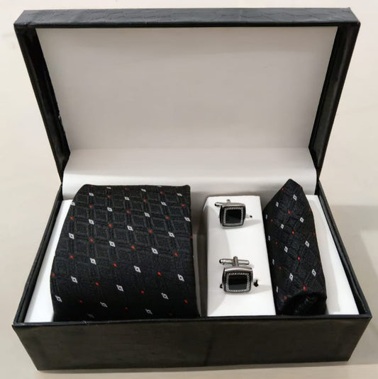 Black patterned tie and cufflinks set in a box