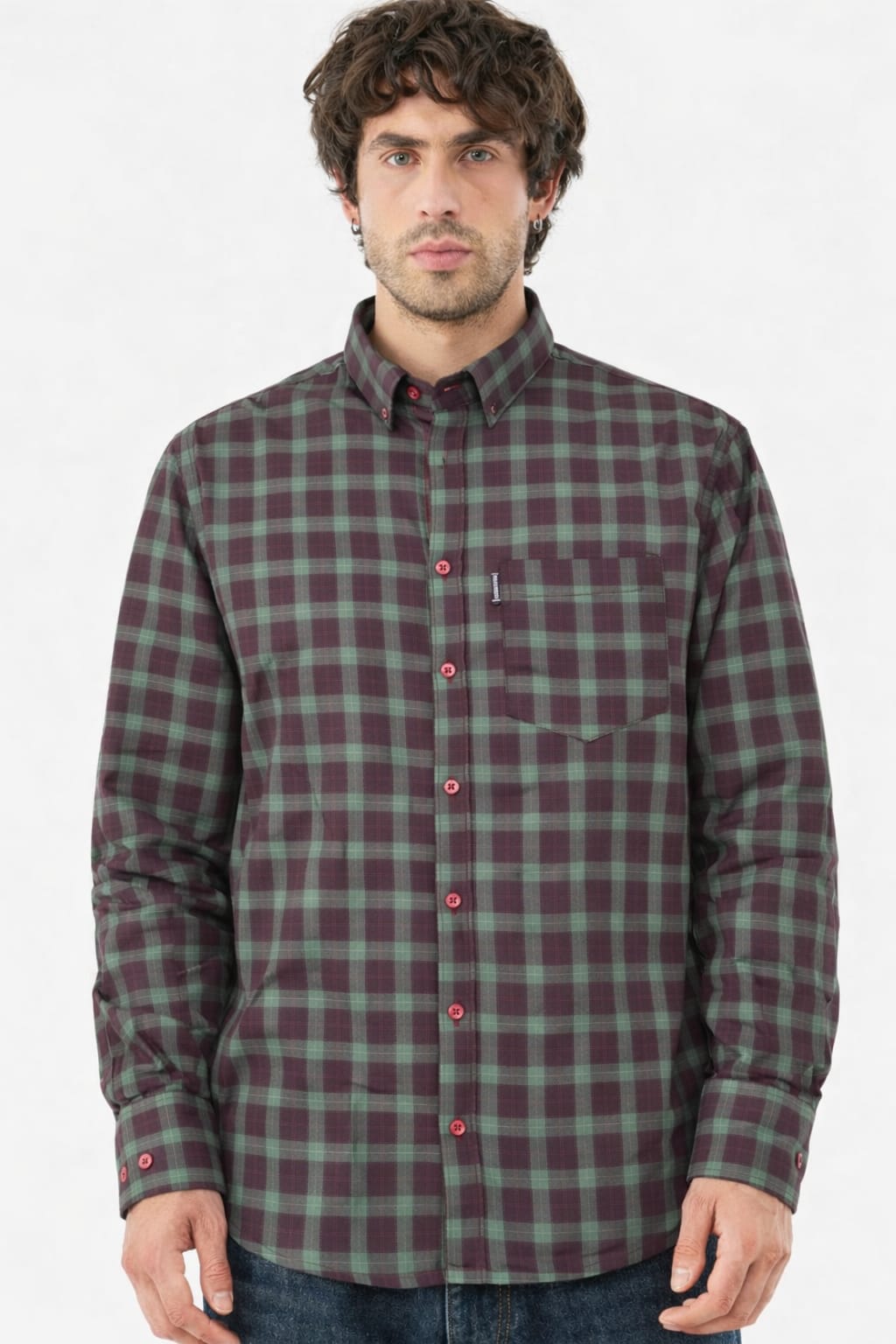 Man wearing a green and red plaid shirt on a white background