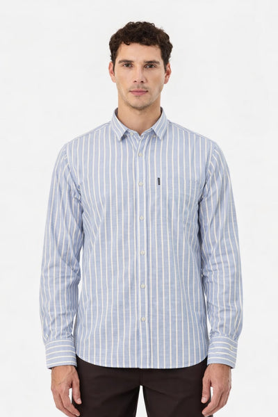 Man wearing a blue and white striped shirt on a white background