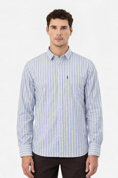 Man wearing a blue and white striped shirt on a white background