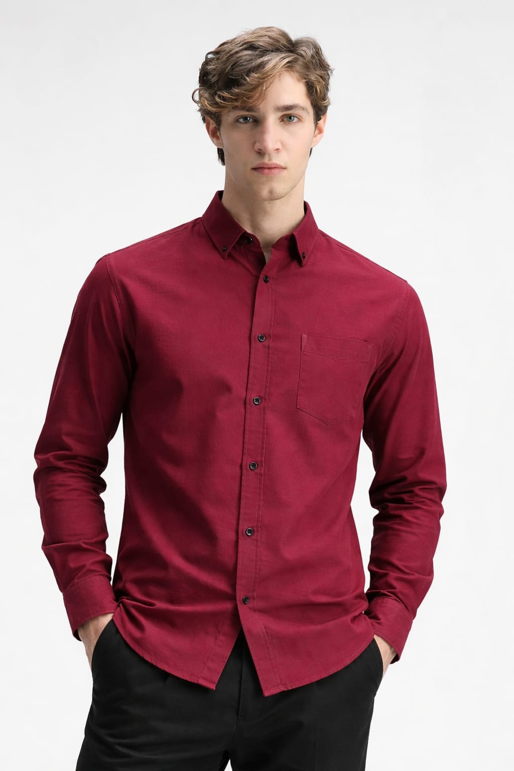 Man wearing a red shirt on a white background