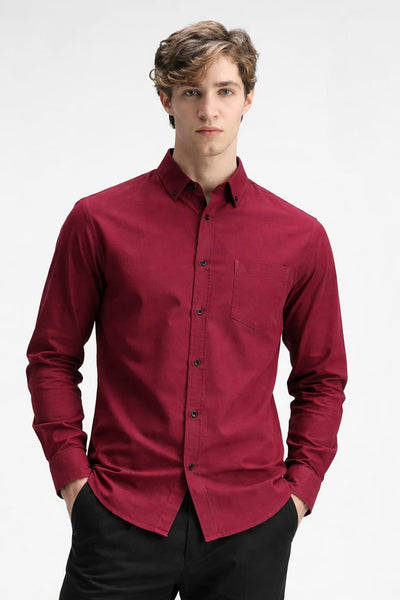Man wearing a red shirt on a white background