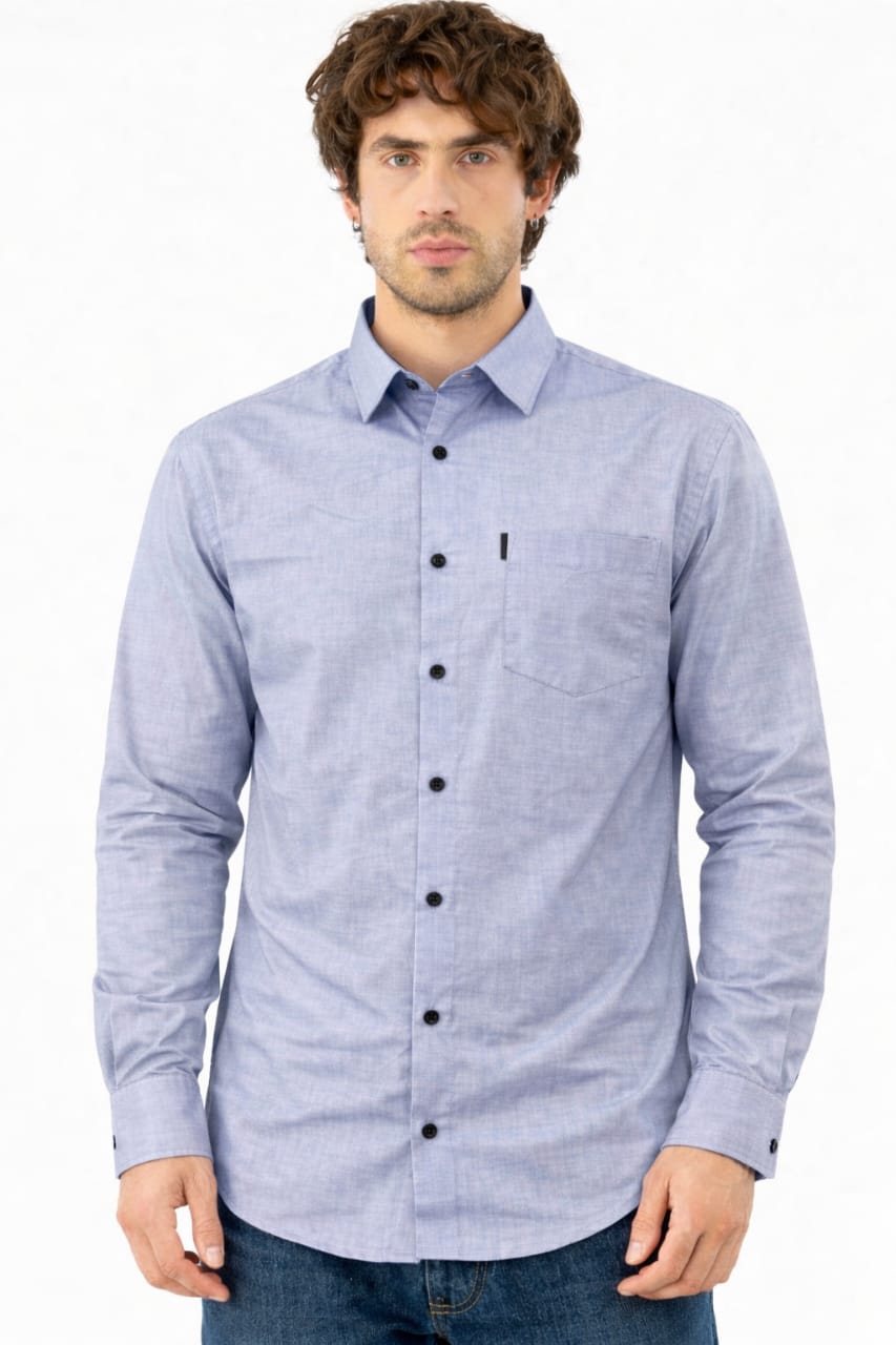 Man wearing a light blue button-up shirt on a white background