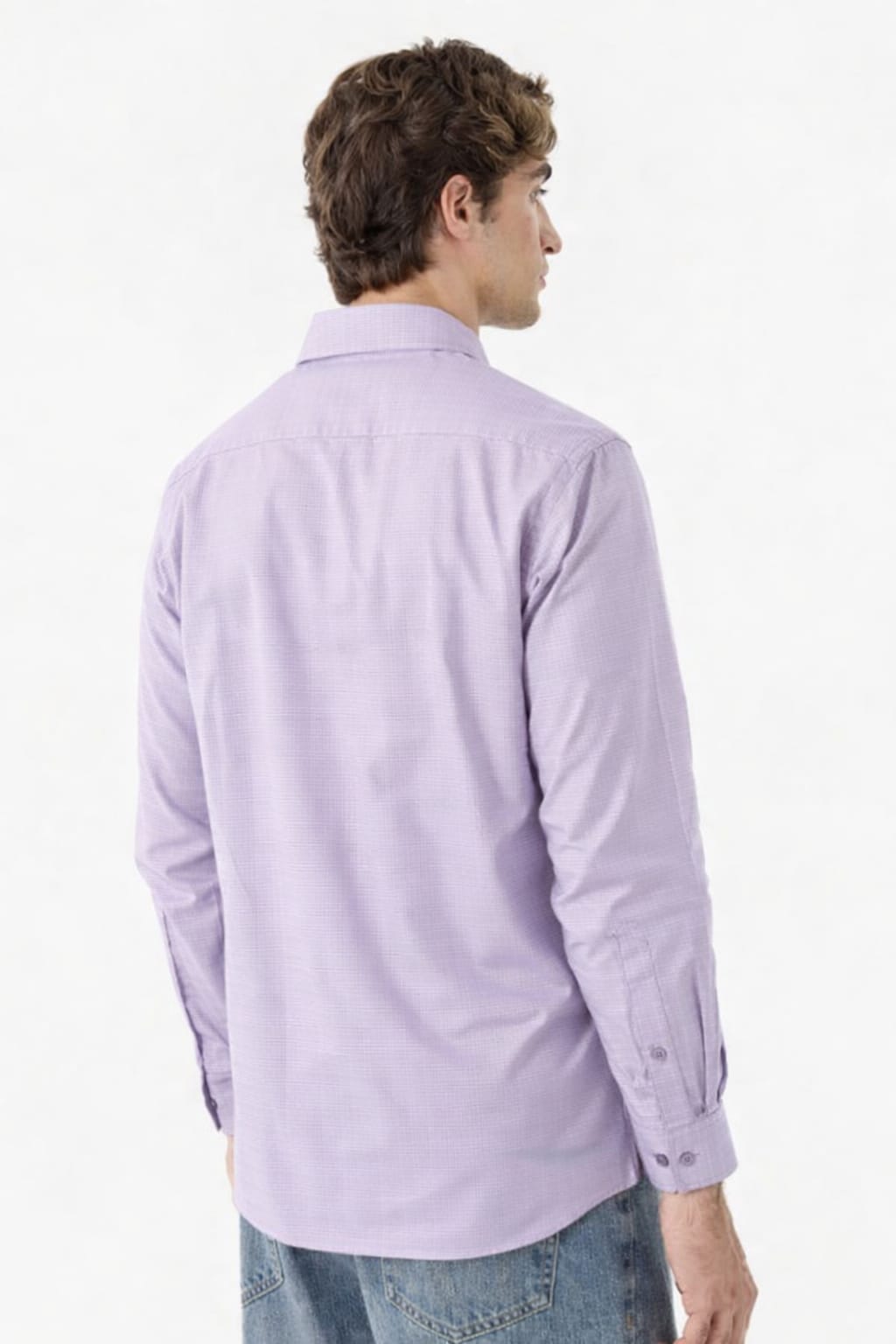 Person wearing a light purple shirt on a white background