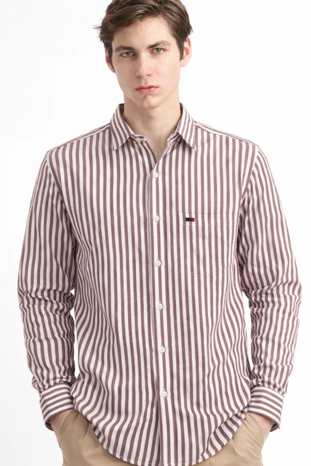 Man wearing a red and white striped shirt on a white background