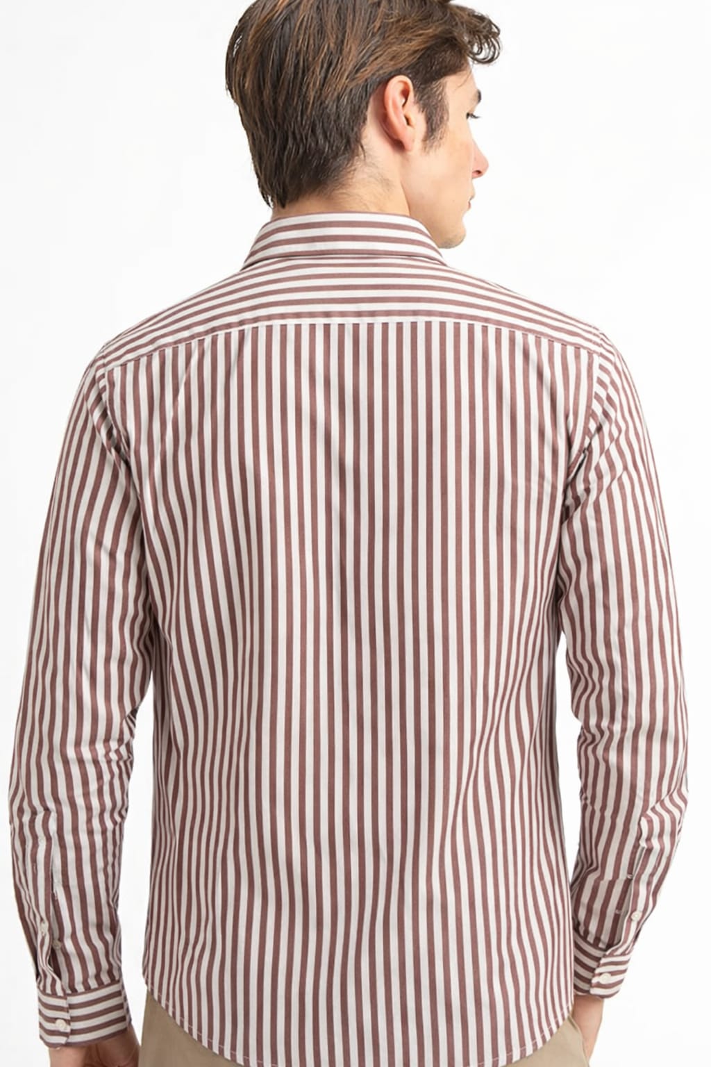 Man wearing a red and white striped shirt on a white background