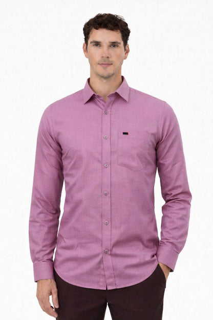 Man wearing a purple button-up shirt on a white background