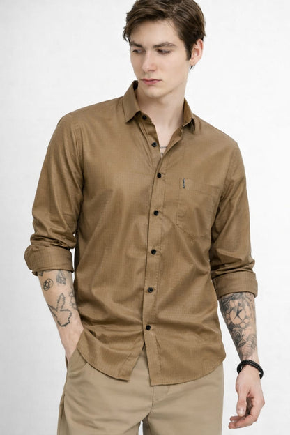 Man wearing a brown shirt with a white background