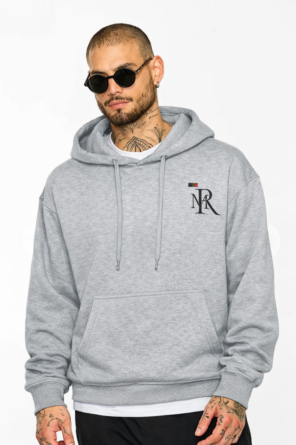 Man wearing a gray hoodie with a logo on a white background
