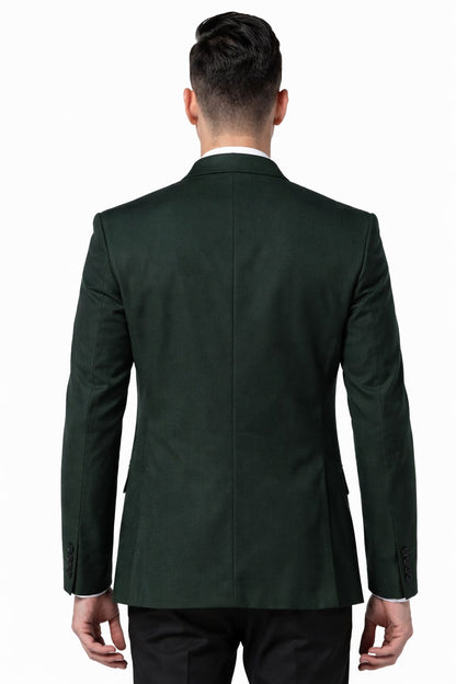 Man wearing a dark green suit jacket on a white background