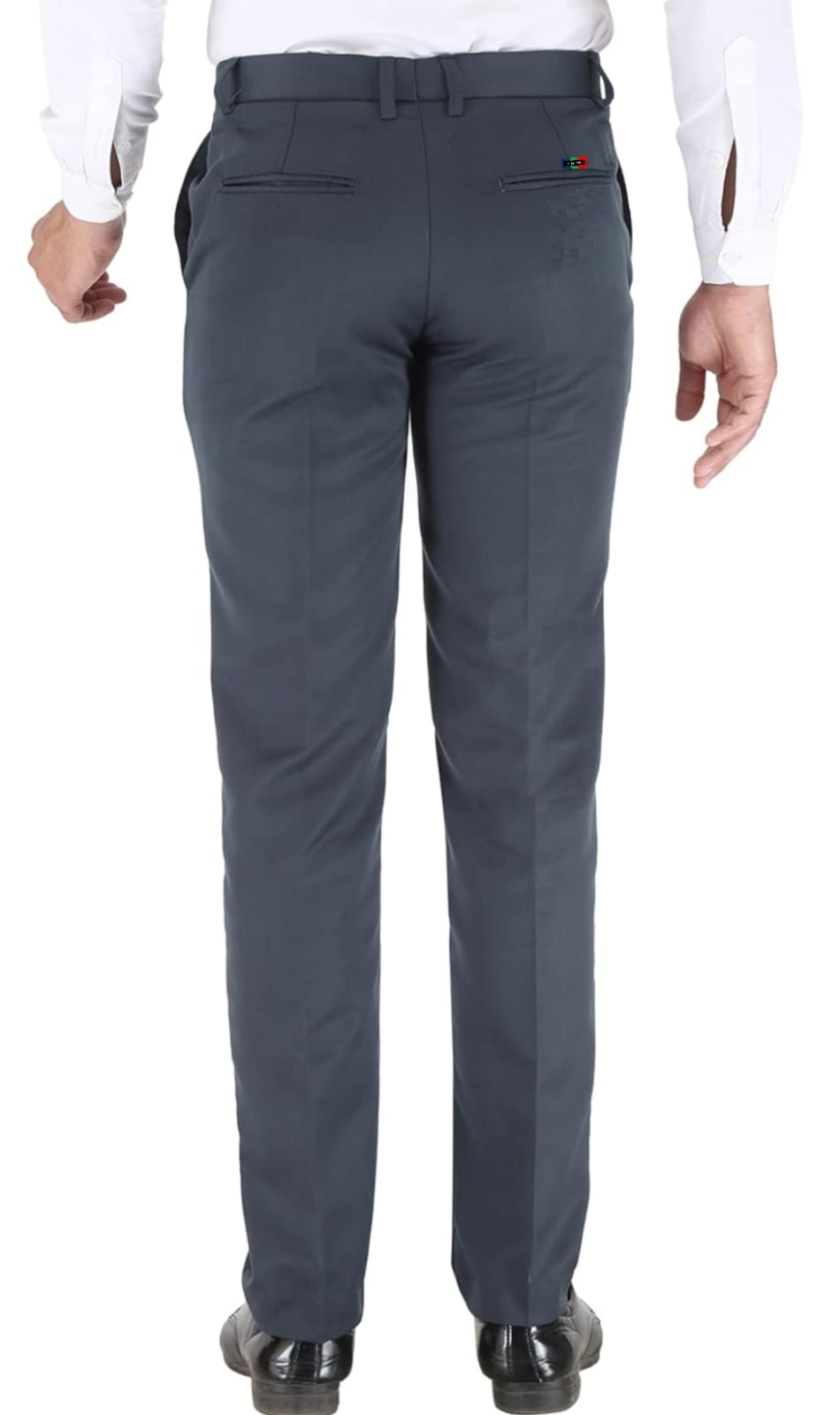 Gray pants worn by a person on a white background