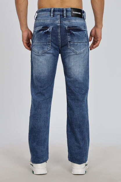 Blue jeans worn by a person on a white background