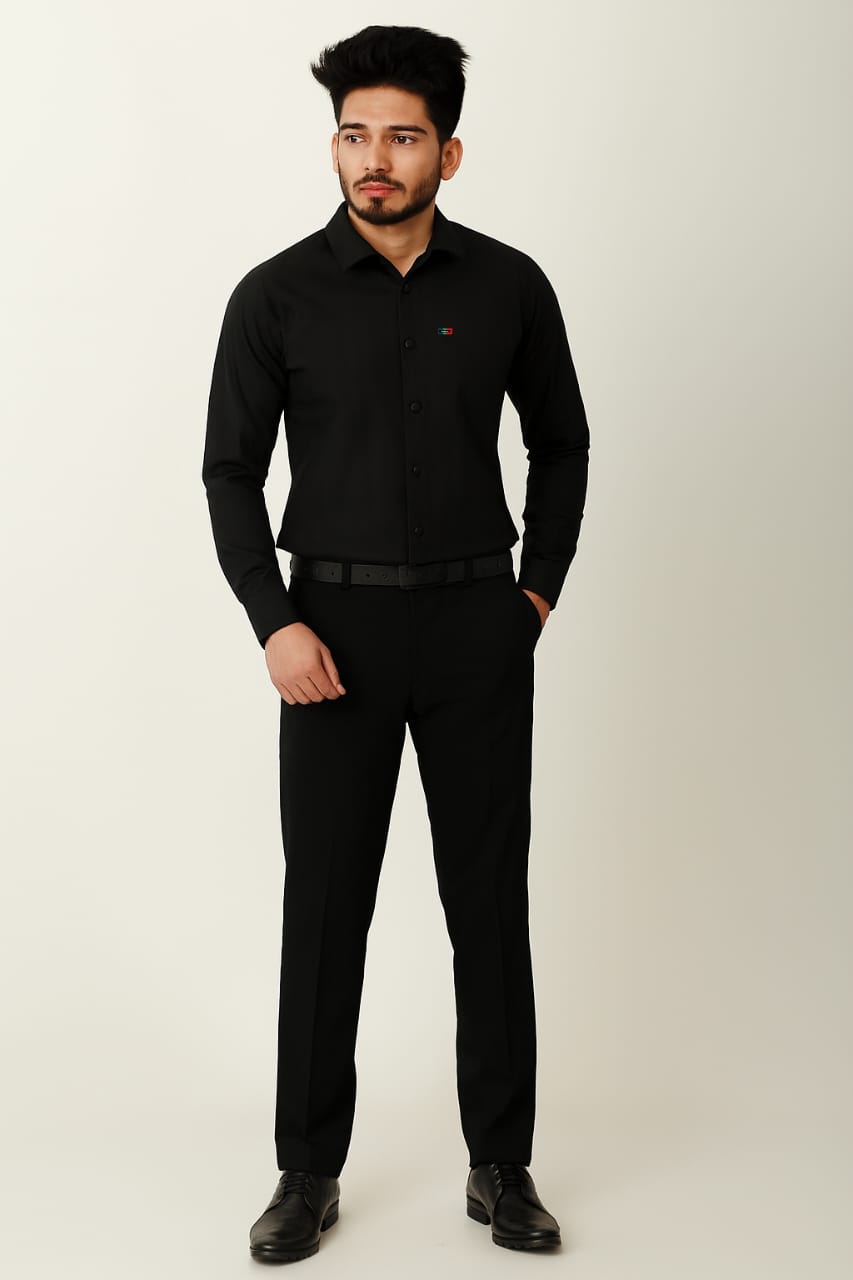 Man wearing a black shirt and pants on a white background