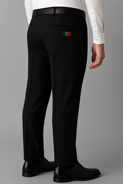 Black dress pants with a logo on the pocket worn by a person against a gray background