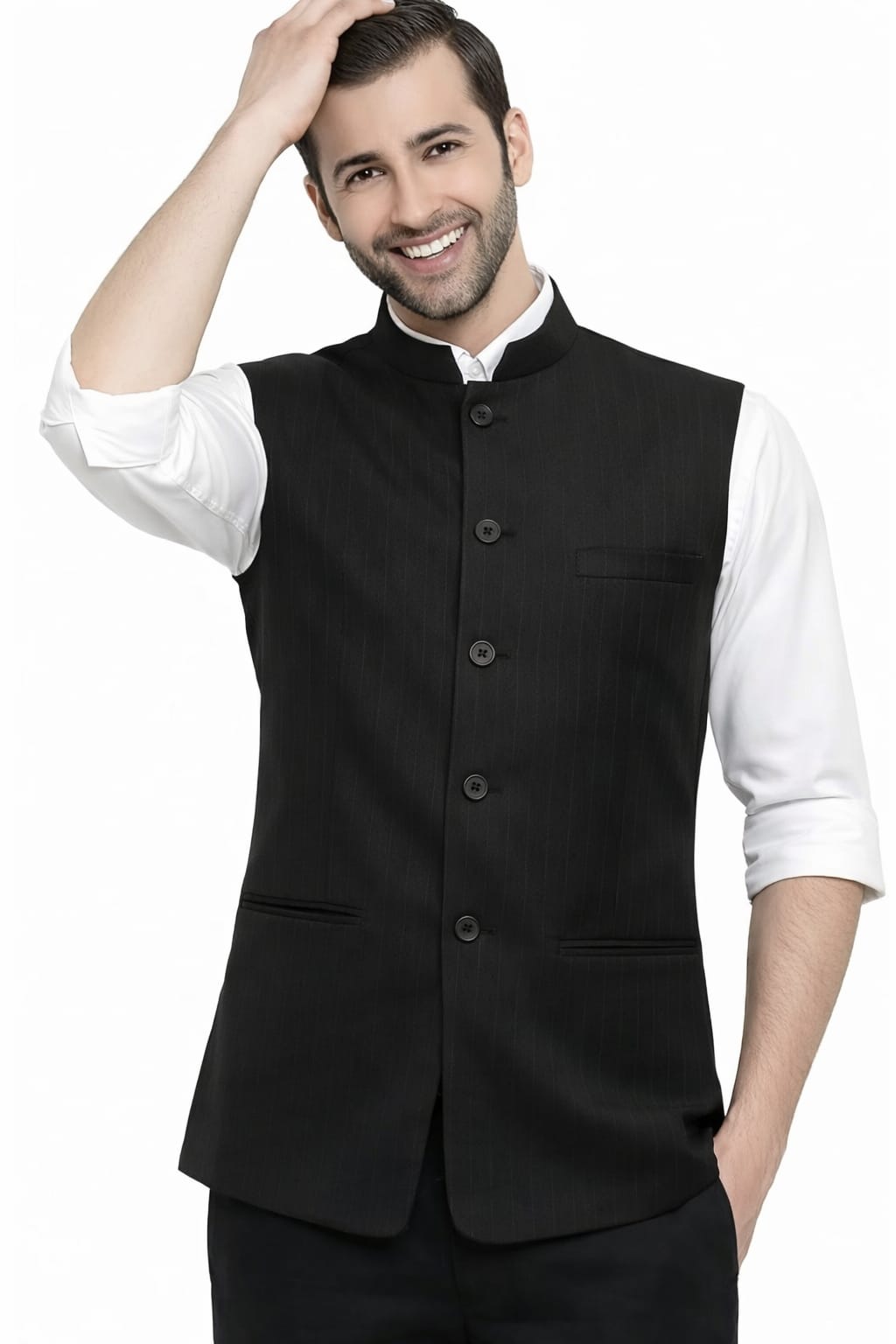 Man wearing a black vest over a white shirt on a white background