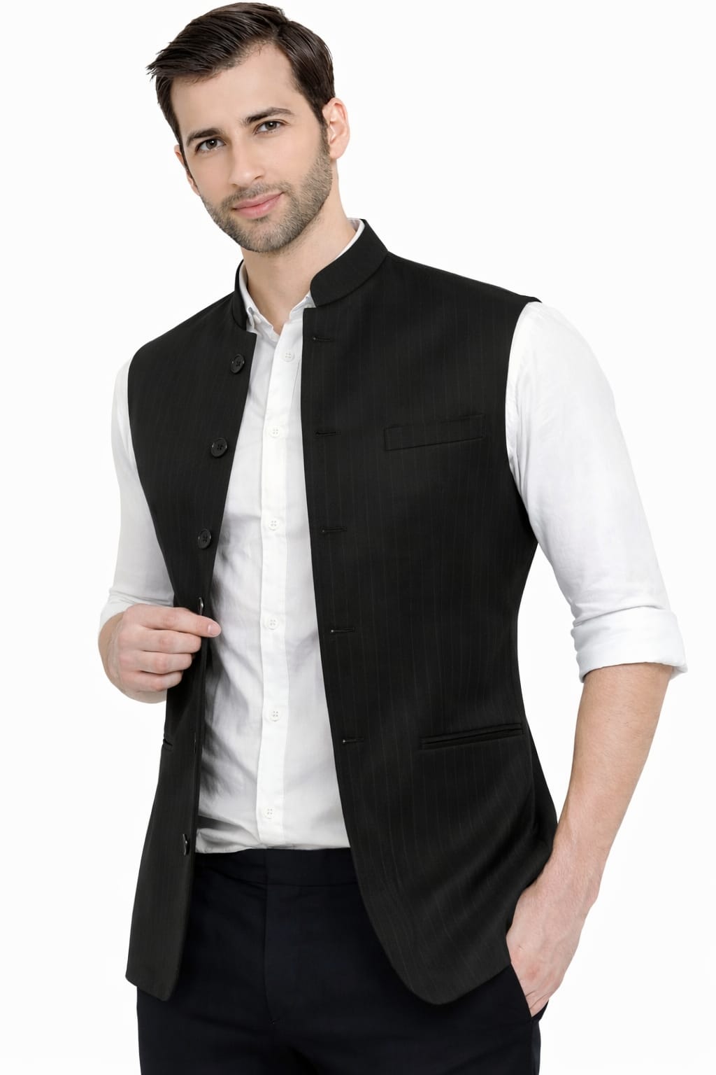 Man wearing a black vest over a white shirt on a white background