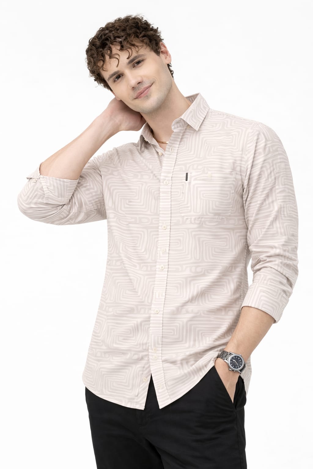 Man wearing a light-colored striped shirt on a white background