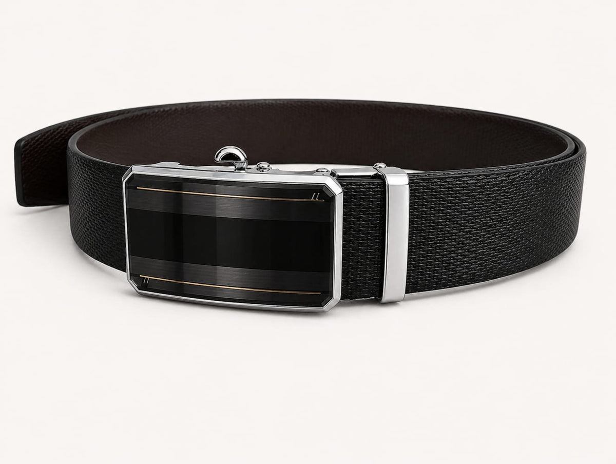 Black belt with a silver buckle on a white background