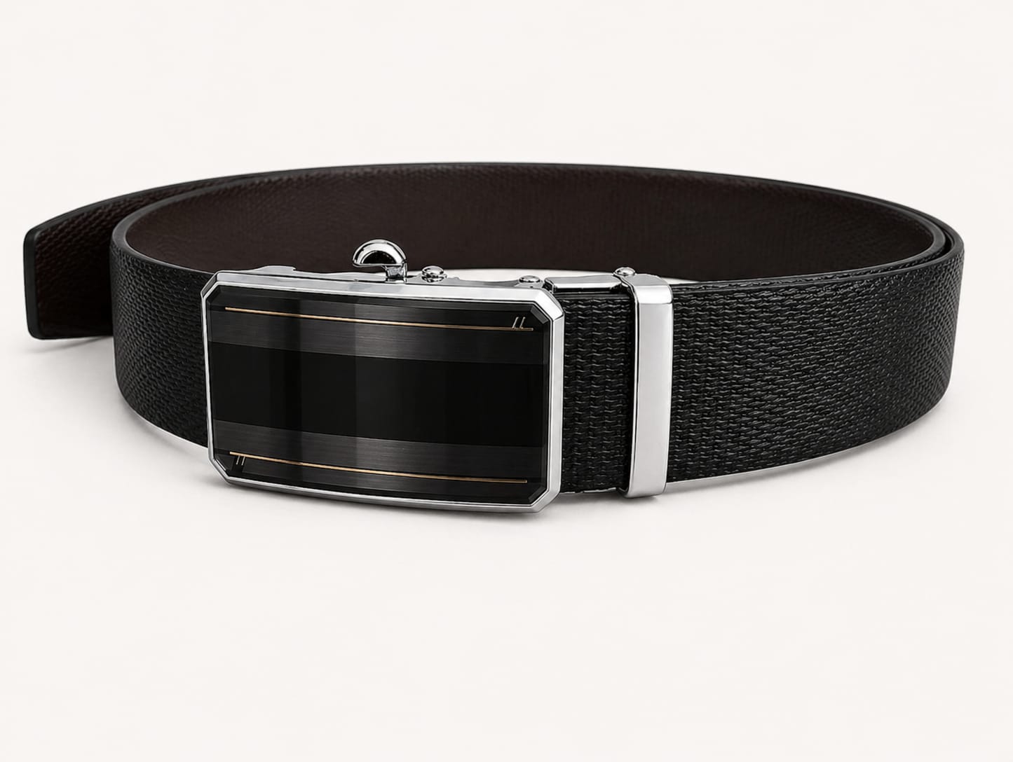 Black belt with a silver buckle on a white background